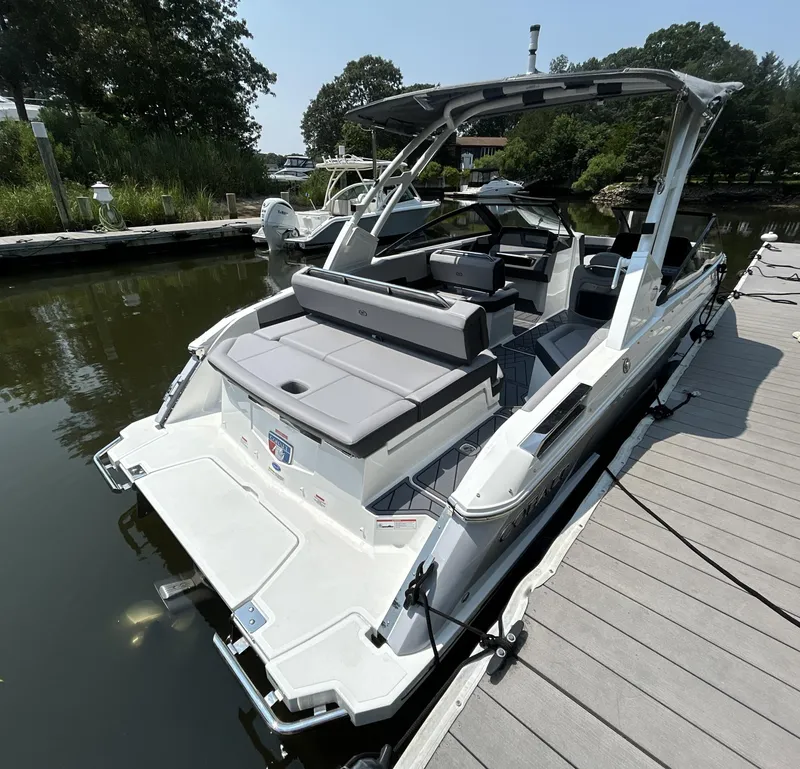 Slide: The Image of 2026 Cobalt R4 boat docked, featuring sleek design and spacious seating. - 4