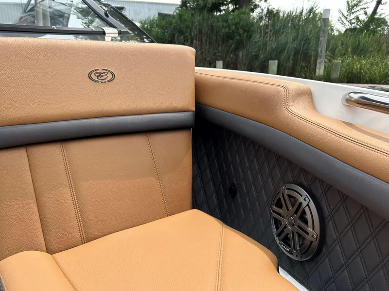 Slide: The Image of 2026 Cobalt R4 Outboard interior with tan leather seats and speaker detail. - 17