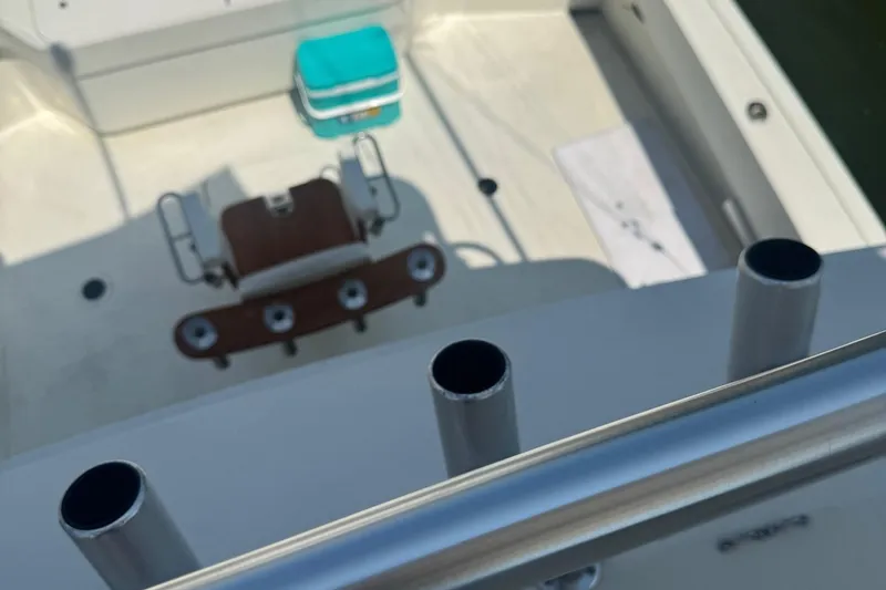 Slide: The Image of 1970 Hatteras 45 Convertible boat deck with fishing chair and cooler. - 8