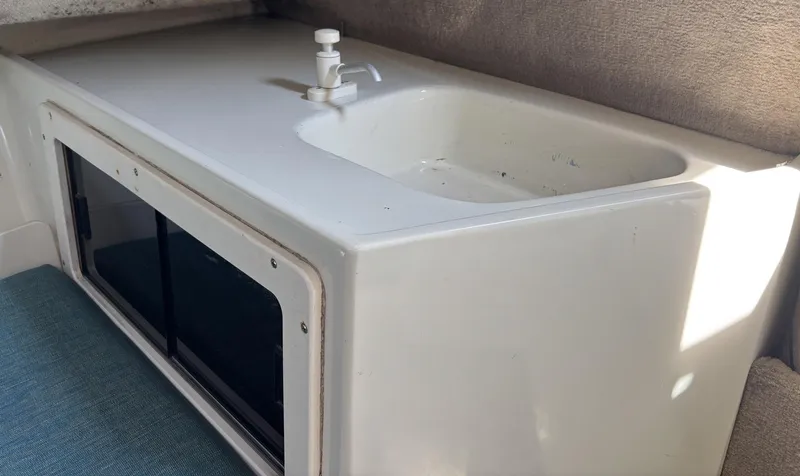 Slide: The Image of Interior sink and storage area of 2000 Hydra-Sports 230 Seahorse WA boat. - 8