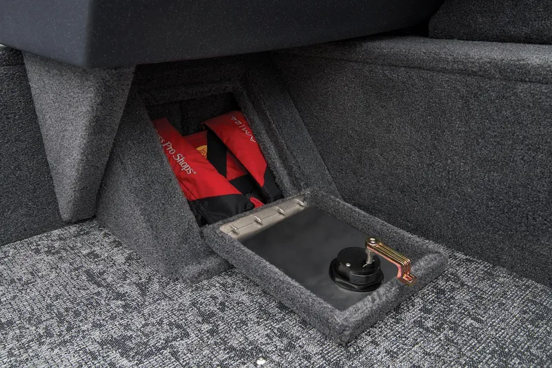 Slide: The Image of Manufacturer Provided Image: Storage compartment in 2026 Tracker Pro Guide V-16 SC boat, featuring safety equipment. - 33