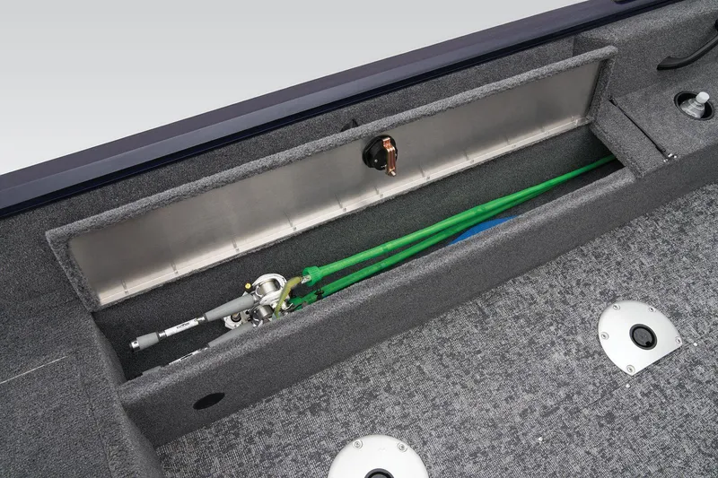 Slide: The Image of Manufacturer Provided Image: 2026 Tracker Pro Guide V-16 SC boat interior with rod storage compartment. - 34