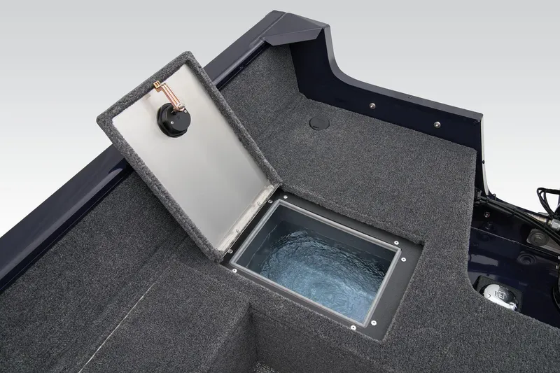 Slide: The Image of Manufacturer Provided Image: 2026 Tracker Pro Guide V-16 SC boat with open storage compartment. - 41