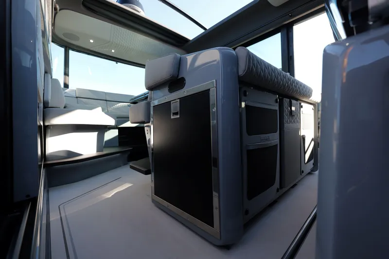Slide: The Image of Luxurious interior of 2026 BRABUS 1500 yacht with modern seating and sleek design. - 17