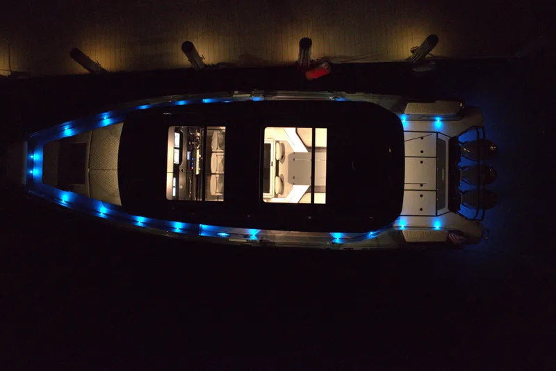 Slide: The Image of Aerial view of 2026 BRABUS 1500 yacht with illuminated deck at night. - 14