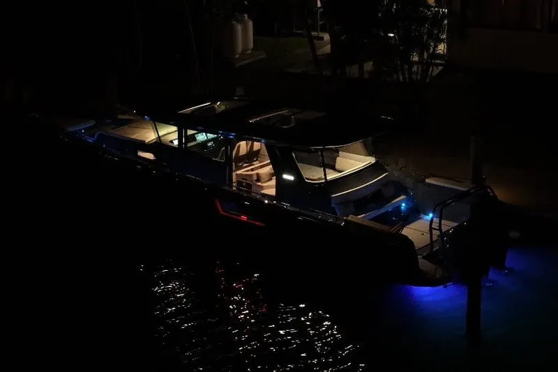 Slide: The Image of Illuminated BRABUS 1500 yacht at night, showcasing sleek design and ambient lighting, 2026 model. - 19