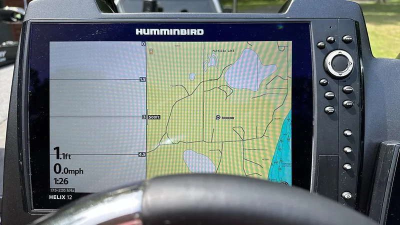 Slide: The Image of Humminbird Helix 12 GPS display on 2024 Vexus DVX20 boat, showing Patricia Lake map. - 10