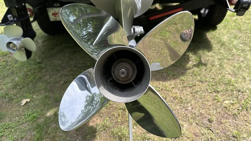 Slide: The Image of 2024 Vexus DVX20 boat propeller, shiny metal blades, close-up view. - 5
