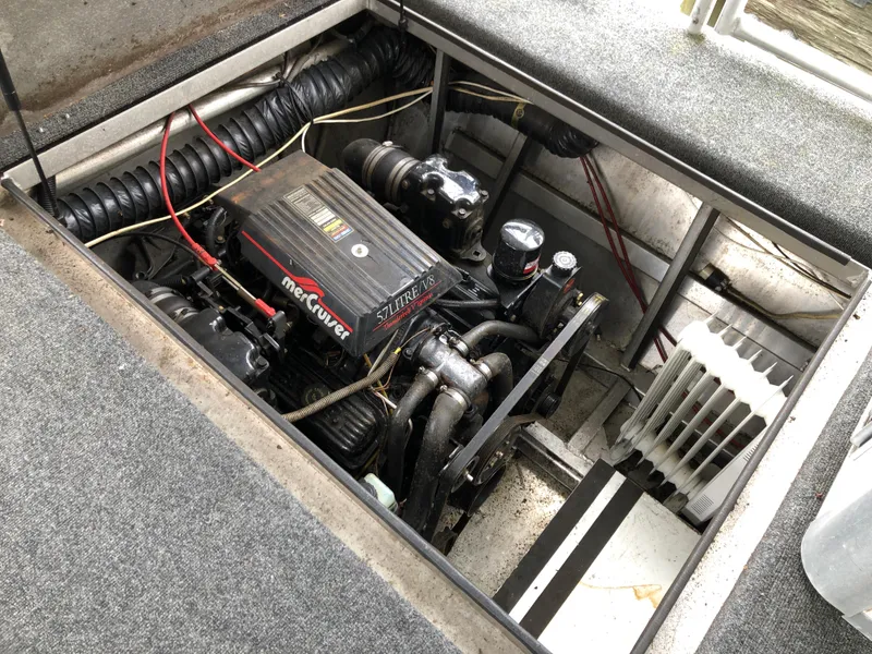 Slide: The Image of Engine compartment of a 1997 Sumerset 75' X 16' houseboat with MerCruiser 5.7L V8 engine. - 24