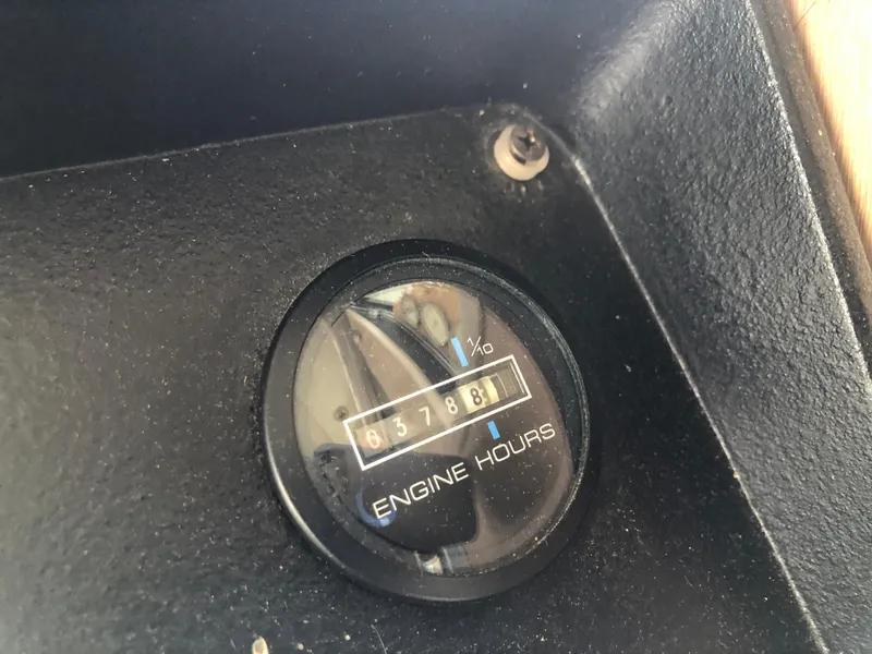 Slide: The Image of Close-up of engine hours gauge on 1997 Sumerset 75' X 16' houseboat. - 29