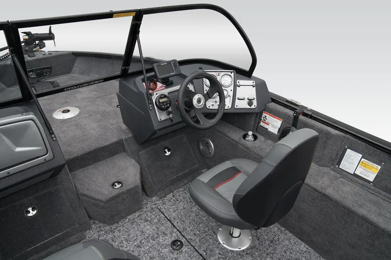 Slide: The Image of Manufacturer Provided Image: 2026 Tracker Pro Guide V-175 WT boat interior with steering console and seating. - 29