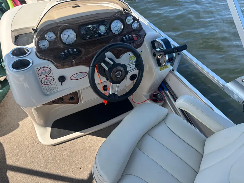 Slide: The Image of Steering console of 2010 Harris FloteBote 200 Super Sunliner pontoon boat. - 1