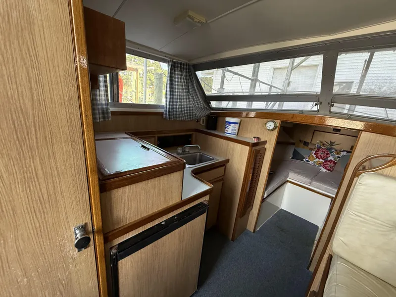 Slide: The Image of Bertram 28 Flybridge Galley - 10
