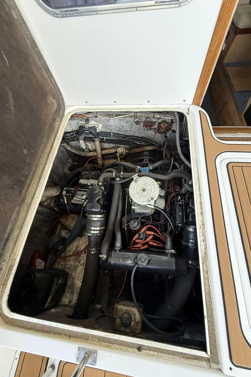 Slide: The Image of Bertram 28 Flybridge Port Engine - 15