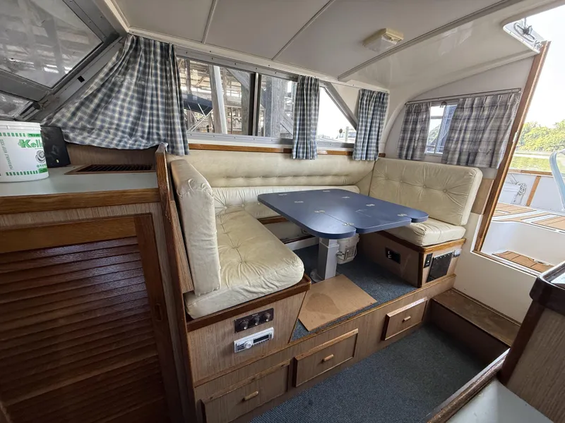 Slide: The Image of Bertram 28 Flybridge Dinette - 9