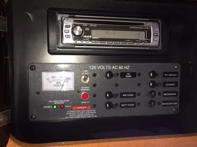 Slide: The Image of Control panel of a 2007 Chaparral 275 SSi boat with stereo and electrical switches. - 12