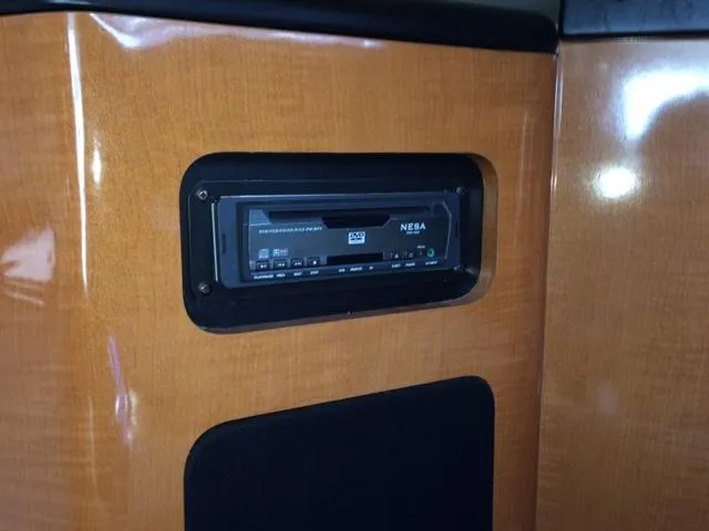 Slide: The Image of 2007 Chaparral 275 SSi interior with NESA audio system installed in wooden panel. - 8