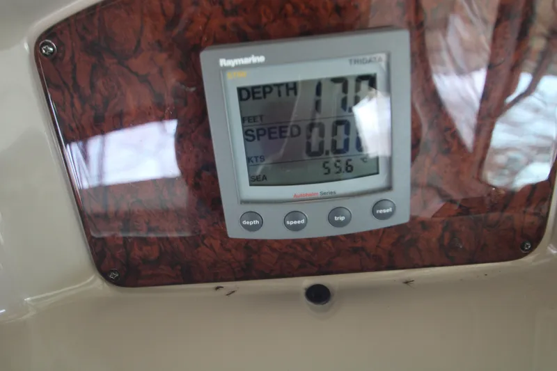 Slide: The Image of Raymarine display on 2003 Sea Ray 320 Sundancer showing depth and speed readings. - 38