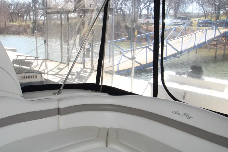 Slide: The Image of 2003 Sea Ray 320 Sundancer interior with dock view through windows. - 40