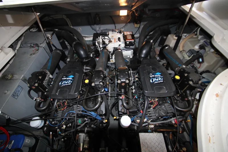 Slide: The Image of Engine room of a 2003 Sea Ray 320 Sundancer with twin MerCruiser 350 MAG MPI engines. - 48