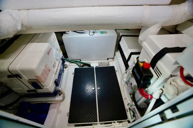 Slide: The Image of Engine room of 2021 Valhalla Boatworks V46, featuring equipment and piping. - 22