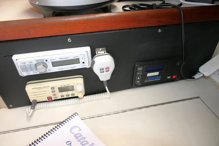 Slide: The Image of Control panel of a 1988 Catalina 34 sailboat with various electronic devices. - 23