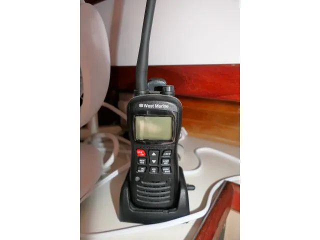 Slide: The Image of Handheld West Marine radio on a Catalina 34 sailboat, model year 1988. - 25