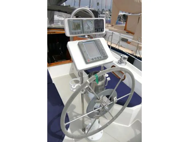 Slide: The Image of Steering wheel and navigation instruments on a 1988 Catalina 34 sailboat. - 41