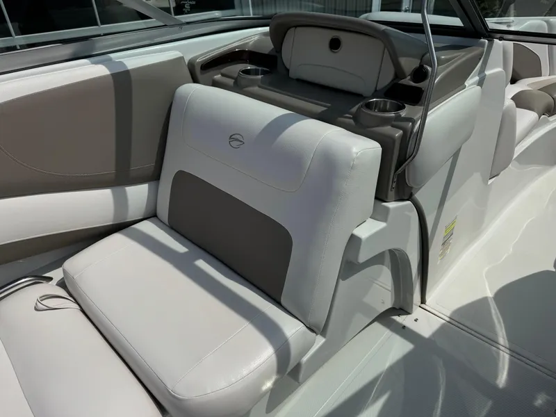 Slide: The Image of 2014 Crownline 235 SS boat interior with beige and gray seating. - 11