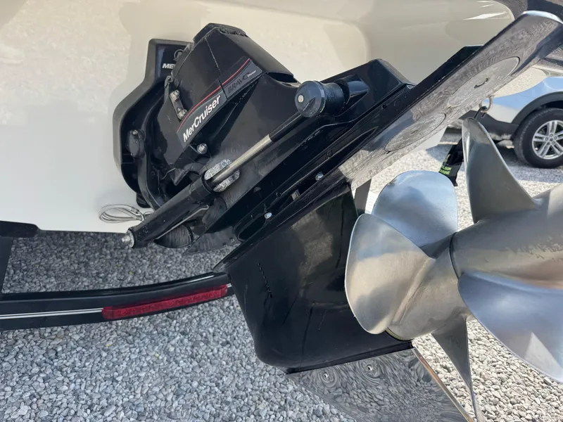 Slide: The Image of Close-up of a 2014 Crownline 235 SS boat's MerCruiser Bravo Three outdrive and propeller. - 21