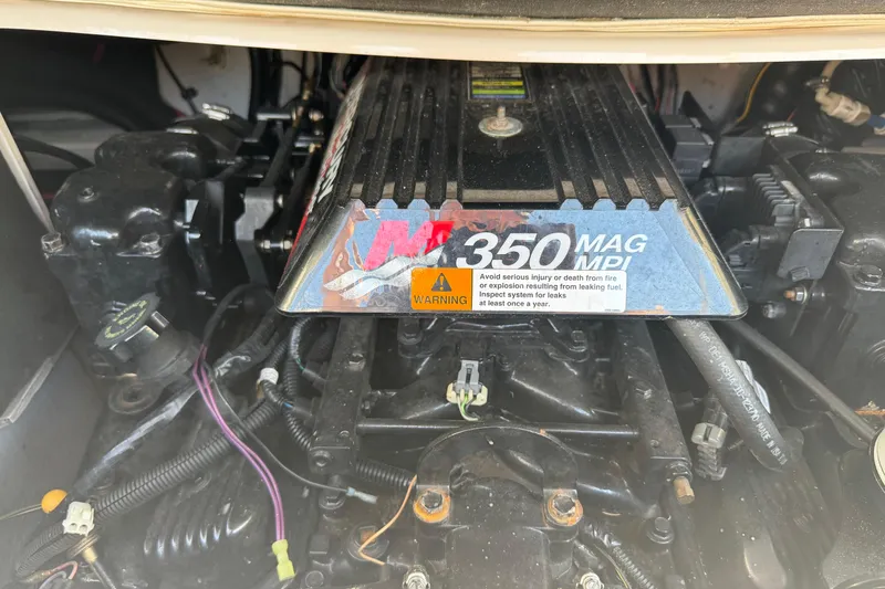 Slide: The Image of Engine of 2014 Crownline 235 SS boat, featuring 350 MAG MPI. - 22