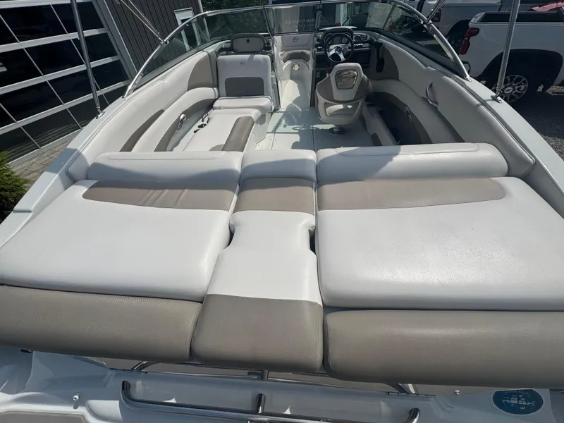 Slide: The Image of 2014 Crownline 235 SS boat interior with spacious seating and modern design. - 9