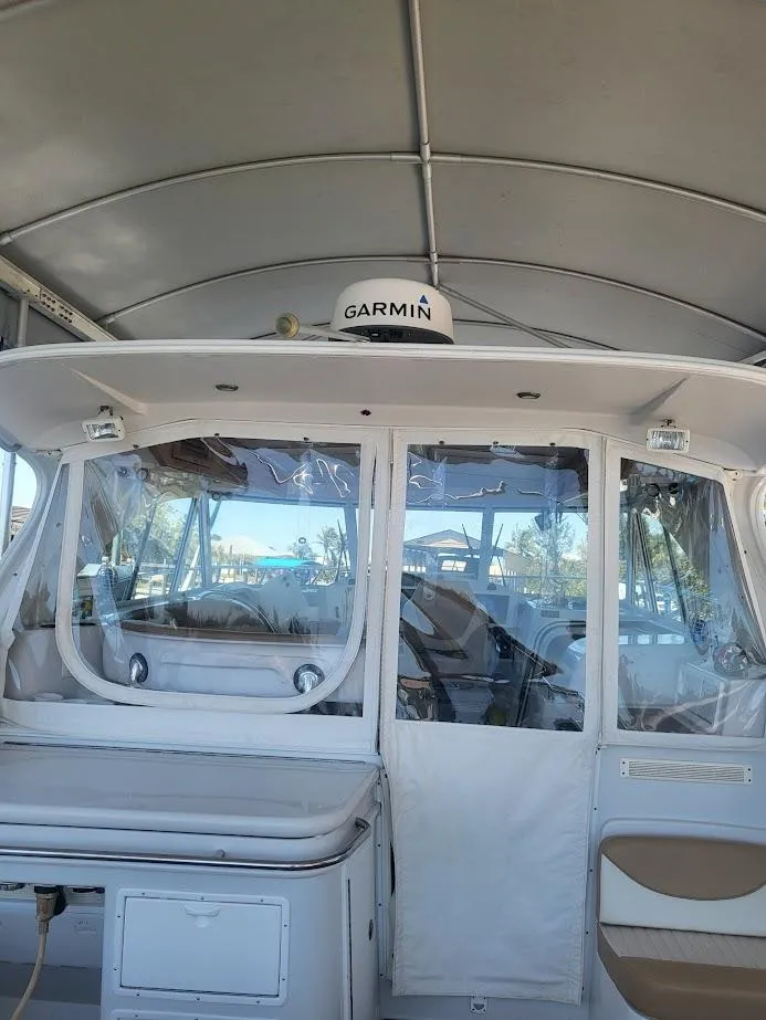 Slide: The Image of 2005 Glacier Bay 3480 Ocean Runner boat interior with Garmin equipment. - 6
