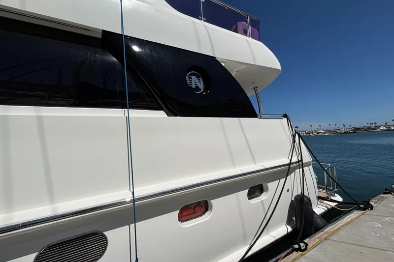 Slide: The Image of Luxury Norseman 80 yacht docked by the water, 2010 model, sunny day. - 115