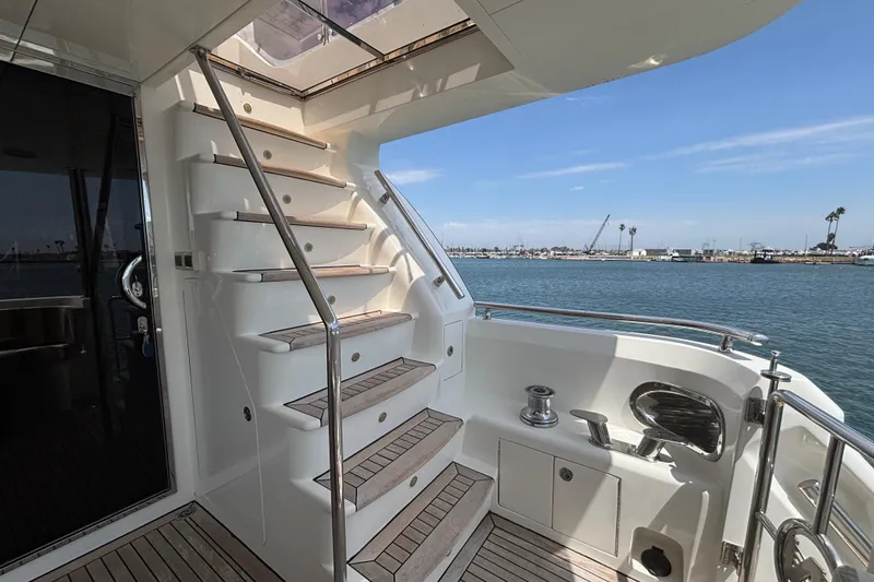 Slide: The Image of Staircase on 2010 Norseman 80 yacht with ocean view and marina background. - 136
