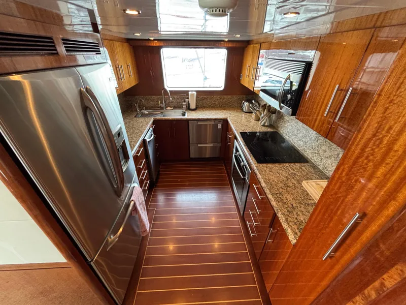 Slide: The Image of Luxurious Norseman 80 yacht kitchen with granite countertops and stainless steel appliances, 2010 model. - 15