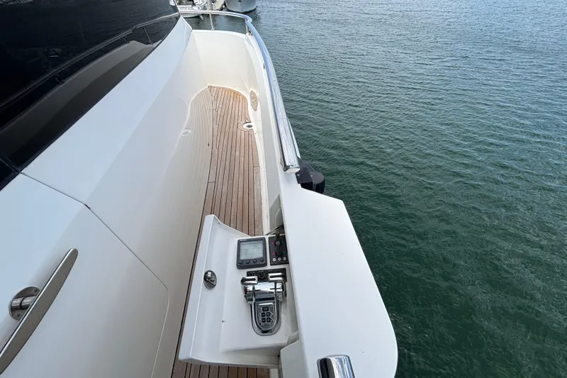 Slide: The Image of Side deck of 2010 Norseman 80 yacht with control panel, overlooking water. - 151