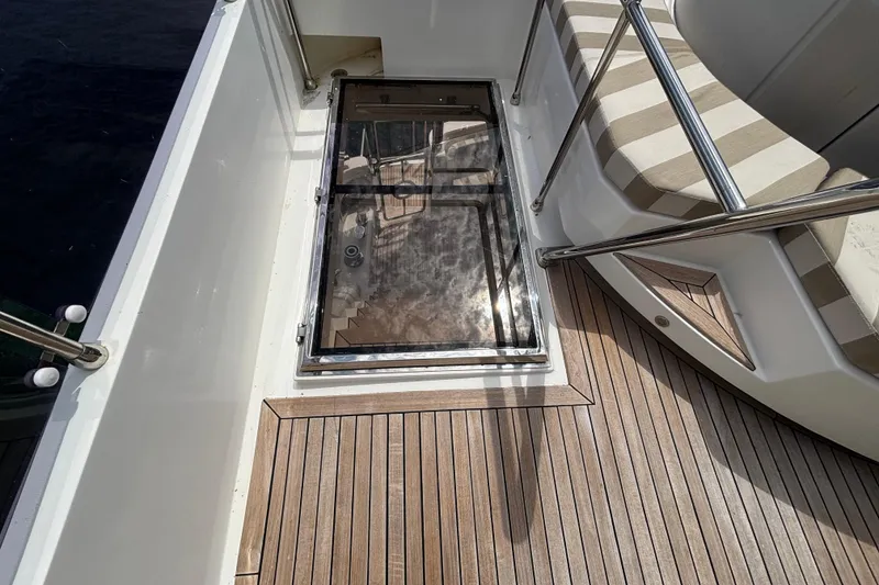 Slide: The Image of Norseman 80 yacht deck with glass hatch and striped seating, 2010 model. - 161