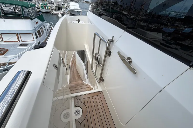 Slide: The Image of Stairway on 2010 Norseman 80 yacht, featuring sleek design and wooden steps. - 166