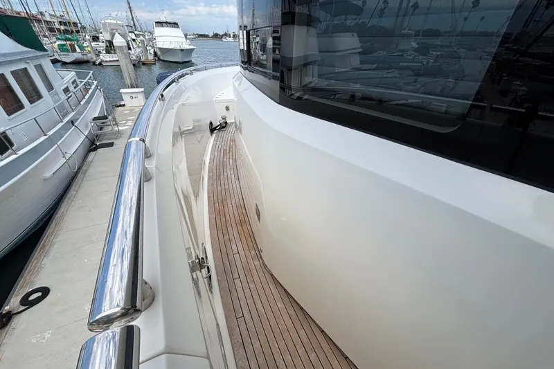Slide: The Image of Side deck view of 2010 Norseman 80 yacht docked at marina. - 172