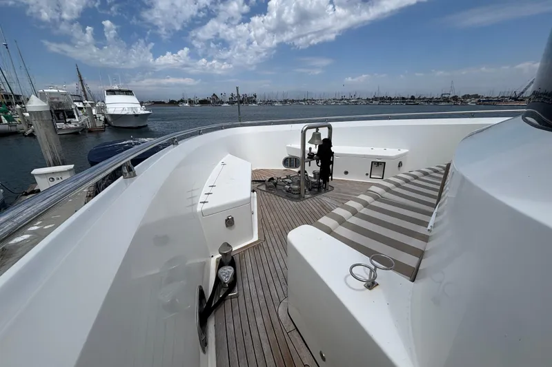 Slide: The Image of Deck view of 2010 Norseman 80 yacht docked at marina under cloudy sky. - 176