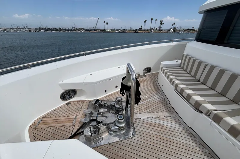 Slide: The Image of Bow view of 2010 Norseman 80 yacht with striped seating and teak deck. - 177