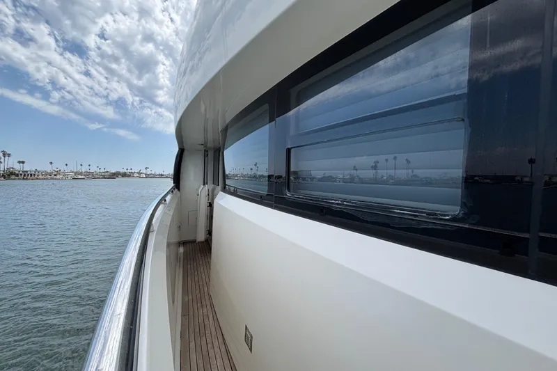 Slide: The Image of Side view of 2010 Norseman 80 yacht with ocean and sky reflection. - 183