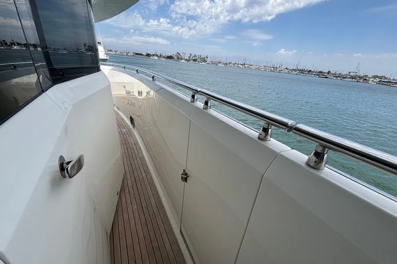Slide: The Image of Side deck of 2010 Norseman 80 yacht with ocean view and clear sky. - 185