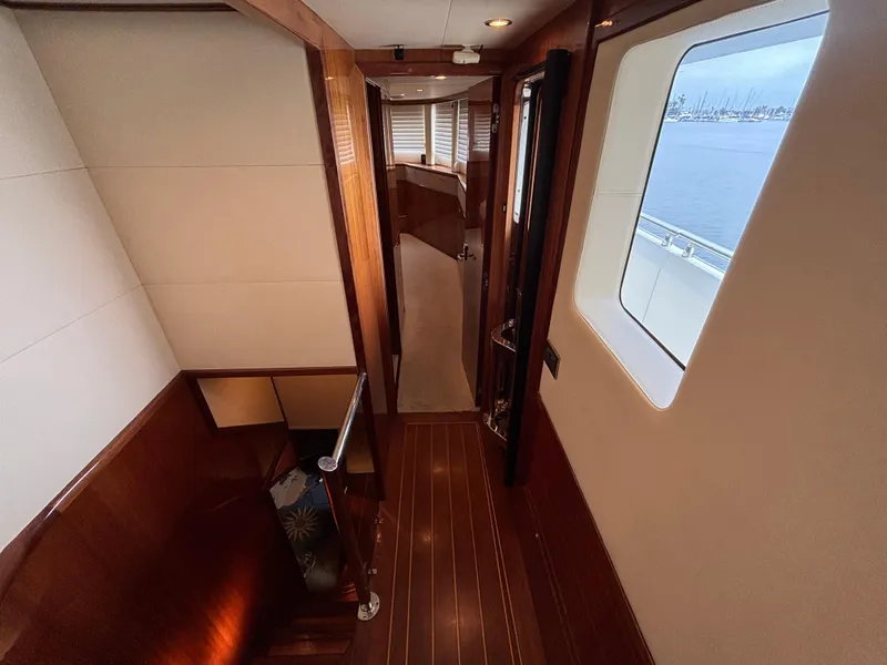 Slide: The Image of Luxurious interior of 2010 Norseman 80 yacht with wooden finishes and ocean view. - 22