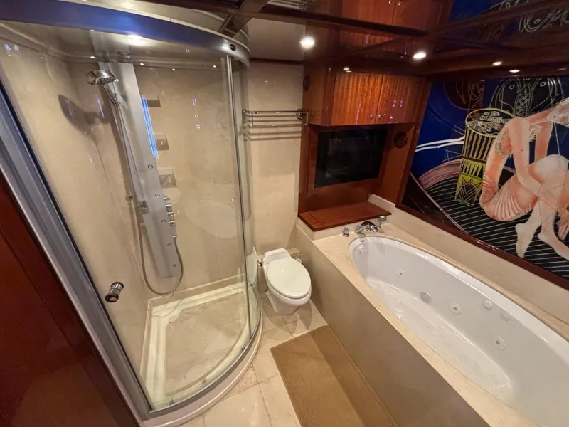 Slide: The Image of Luxurious bathroom in 2010 Norseman 80 yacht with shower and jacuzzi tub. - 26