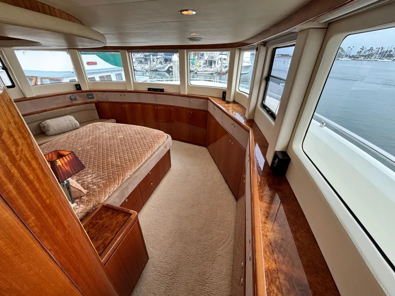 Slide: The Image of Luxurious Norseman 80 yacht bedroom with panoramic windows and elegant wood finishes, 2010 model. - 30