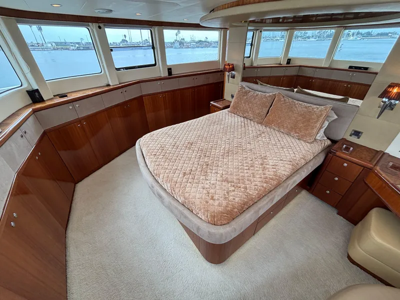 Slide: The Image of Luxurious Norseman 80 yacht bedroom with panoramic windows and elegant wood finishes, 2010 model. - 34