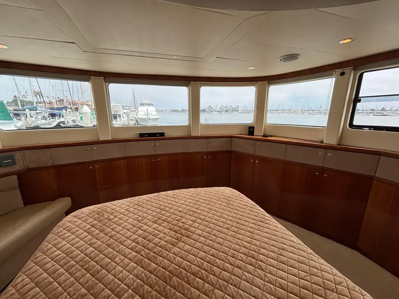 Slide: The Image of Luxurious Norseman 80 yacht interior with panoramic windows and elegant wood cabinetry, 2010 model. - 37
