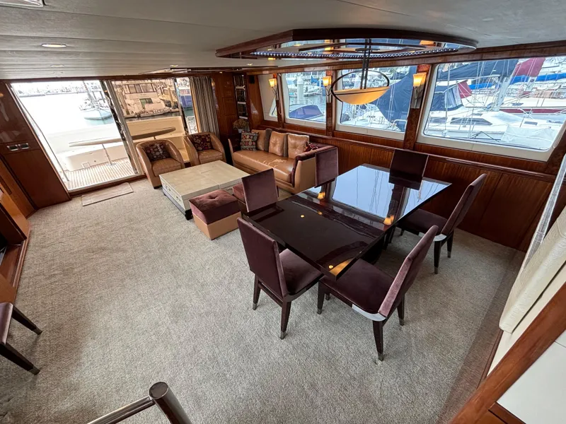 Slide: The Image of Luxurious interior of 2010 Norseman 80 yacht with elegant dining and seating area. - 4